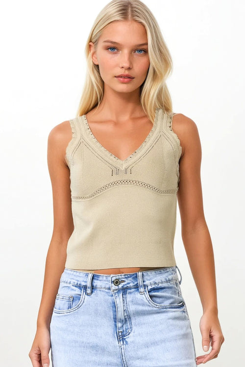 Beige geribde gebreide top met geschulpte V-hals