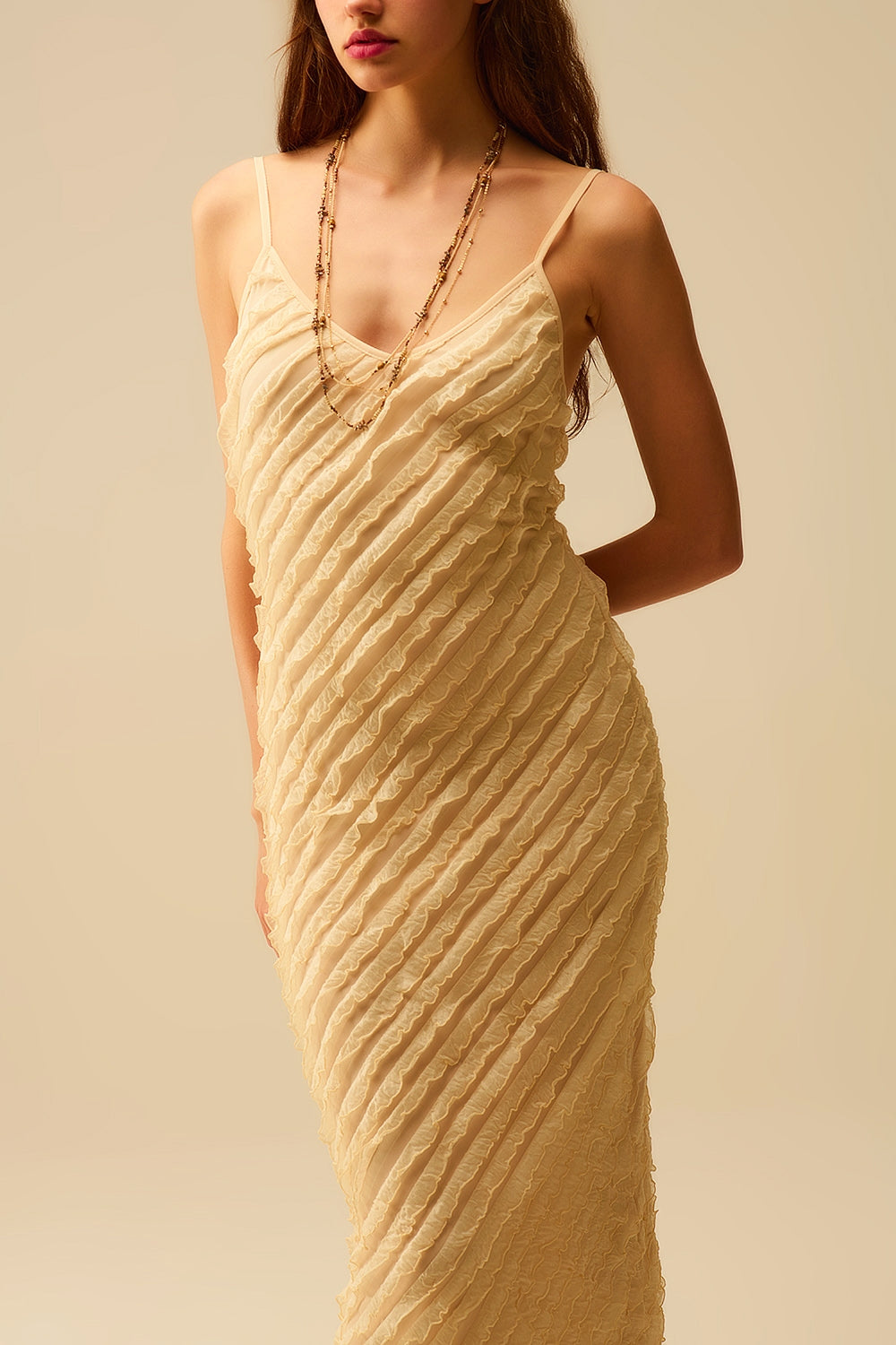 maxi-jurk in ecru met franjes en bandjes