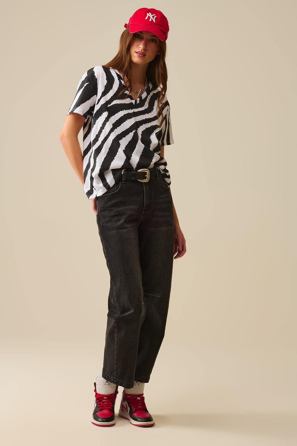 T-shirt met V-hals en zwarte zebraprint